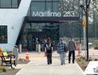 Students and caregivers walk into the new Maritime|253 Skills Center for the Open House